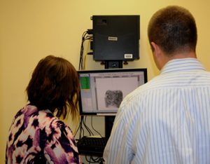 person getting finger print scanned